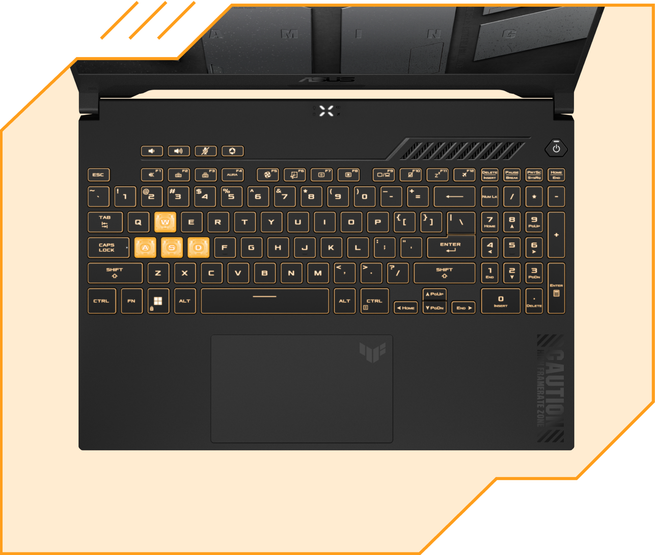 Vue de haut en bas du TUF Gaming F15, avec les touches éclairées en jaune RGB.
