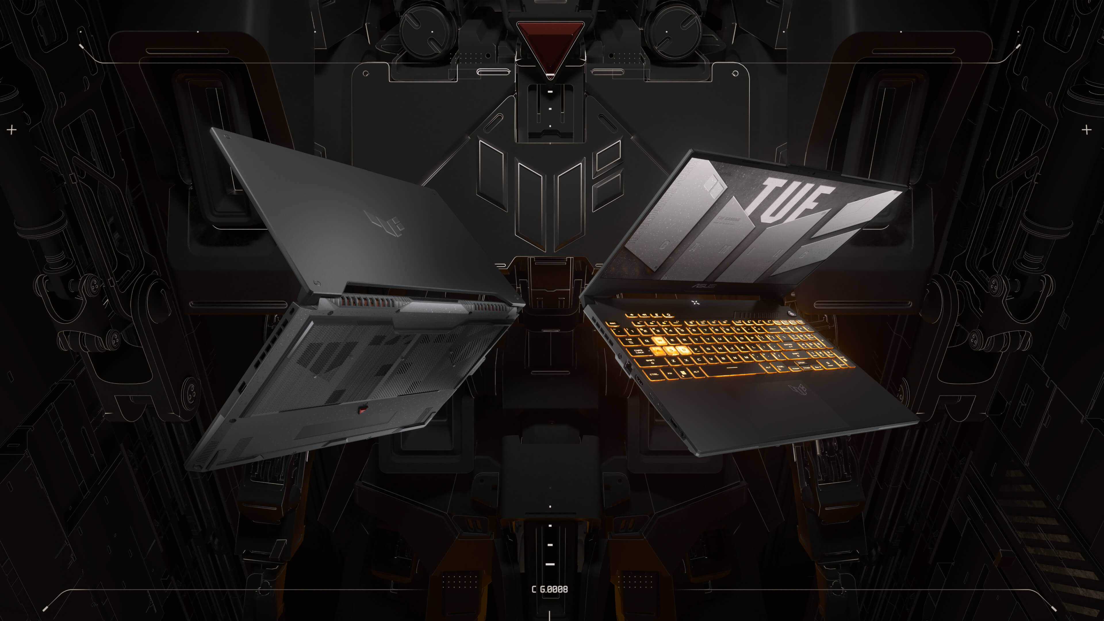 Deux TUF Gaming F15, dos à dos avec de grands monolithes en arrière-plan.